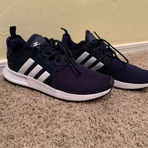 Blue adidas running shoes